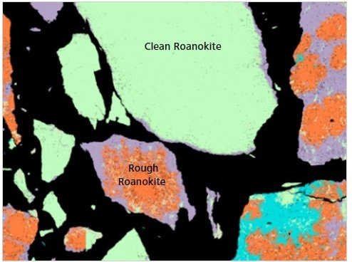 Classified Mineralogic image to show the differences between “clean roanokite” and “rough roanokite”; the latter is less liberated and contains very fine gangue inclusions that will be released into the slurry as the target mineral is digested through leaching.