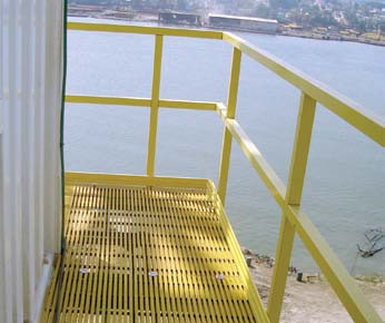 Strongwell’s 2 inch, square, SAFRAIL™ industrial handrail and DURADEK® fiberglass grating